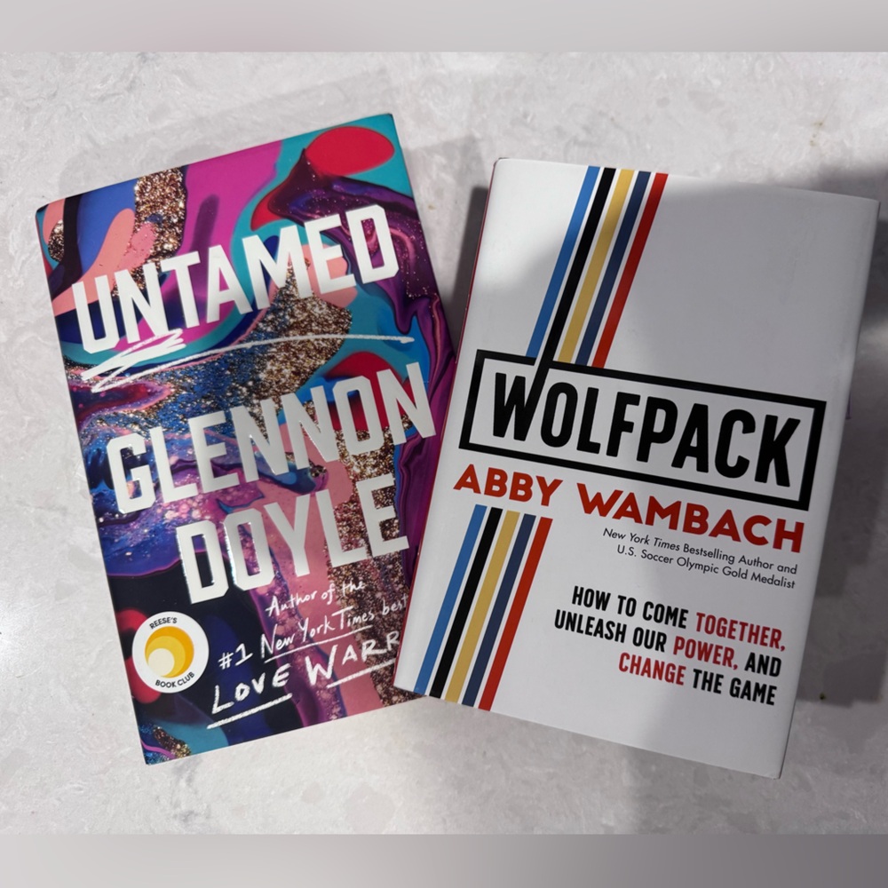 Set of 2 books: Untamed bu Glennon Doyle and Wolfpack by Abby Wambach